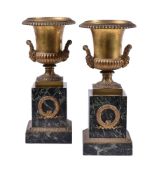 A pair of Continental gilt bronze and marble mounted twin handled urns