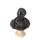 A patinated bronze bust of a gentleman