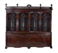 A carved mahogany library bookcase