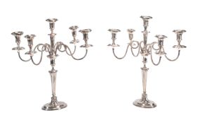 A pair of silver plated five branch candelabra