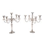 A pair of silver plated five branch candelabra