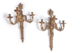 A pair of substantial French gilt composition three light wall appliqués in Louis XVI style