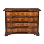 A Continental walnut and marquetry inlaid commode