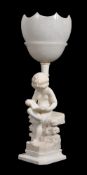 A sculpted alabaster figural table lamp