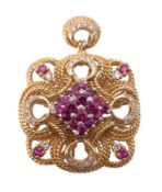 A ruby and diamond pendant