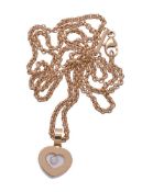 A diamond Happy Pendant by Chopard