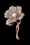 A diamond flower brooch