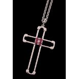A ruby cross pendant