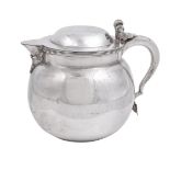 A silver ovoid jug by Edward Barnard & Sons Ltd