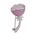 A diamond and pink sapphire brooch