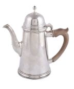 A silver straight-tapered coffee pot by C. J. Vander Ltd