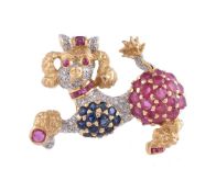 A gemset poodle clip brooch