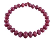 A facetted ruby bead necklace