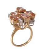 A topaz and diamond ring