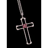 A ruby cross pendant