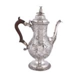 A George III silver baluster coffee pot probably by John Scofield