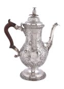 A George III silver baluster coffee pot probably by John Scofield