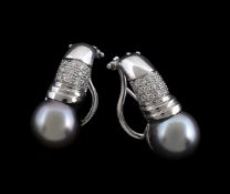A pair of Tahitian cultured pearls and diamond earrings