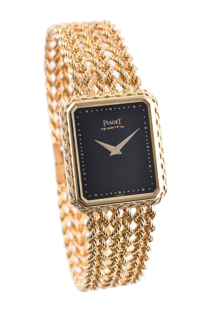 Piaget, Ref. 7148 E 21, Lady's gold bracelet watch, no. 353551 Movement ...