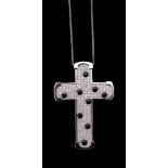 A diamond and onyx cross pendant