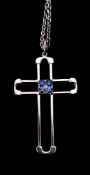 A sapphire cross pendant