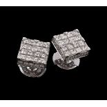 A pair of diamond earrings