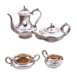 ϒ A matched George IV silver circular four piece tea and coffee service