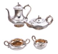 ϒ A matched George IV silver circular four piece tea and coffee service