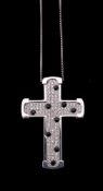 A diamond and onyx cross pendant