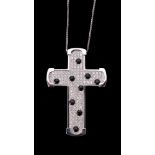 A diamond and onyx cross pendant