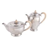 ϒ An Art Deco silver tea pot and coffee pot by Mappin & Webb