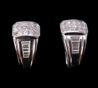 A pair of diamond earrings