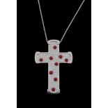 ϒ A diamond and coral cross pendant