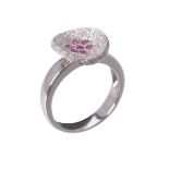 A pink sapphire and diamond ring