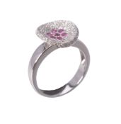 A pink sapphire and diamond ring