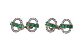 A pair of early 20th century diamond and emerald sleeve links