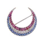 A ruby, diamond and sapphire crescent brooch
