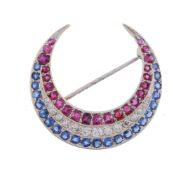 A ruby, diamond and sapphire crescent brooch