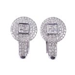 A pair of diamond earrings