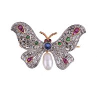 A gemset butterfly brooch