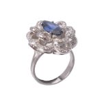 A sapphire and diamond flowerhead cluster dress ring