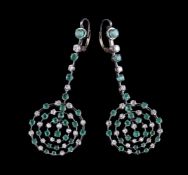 A pair of emerald and diamond earrings