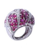 A ruby and diamond bombé dress ring