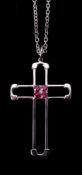 A ruby cross pendant