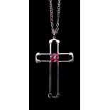 A ruby cross pendant