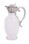 An Edwardian silver mounted cut glass claret jug by W. & C. Sissons