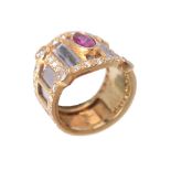 A ruby and diamond band ring