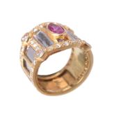 A ruby and diamond band ring