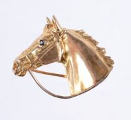 A 9 carat gold horse head brooch