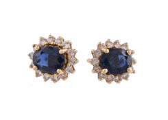 A pair of sapphire and diamond ear studs